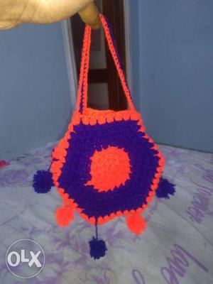 A medium size woolen hand bag