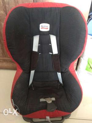 Baby's Black And Pink Car Seat