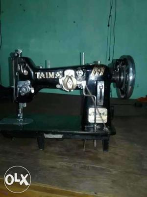 Black And Gray Taima Sewing Machine