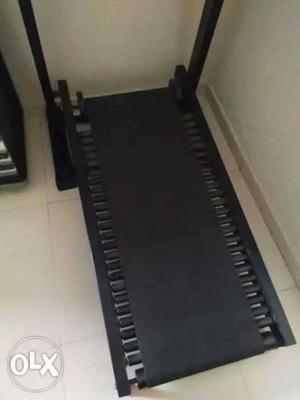 Black treadmill rolar mashin