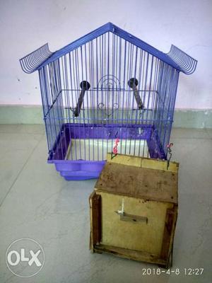 Blue Metal Birdcage And Brown Wooden Nest Box