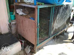 Brown And Green Metal Pet Cage