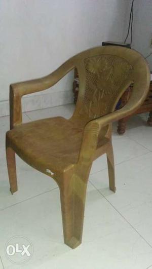 Brown coloured Framed Brown Padded Armchair