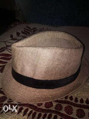 Hat, original cost 250, contact no.