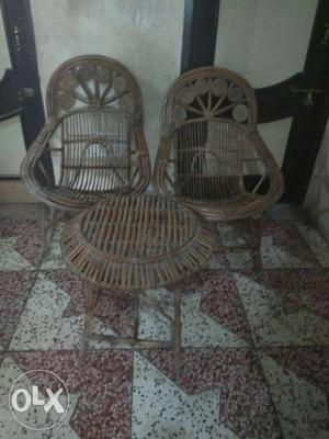 Pure cane wood with a pair of chair and a table