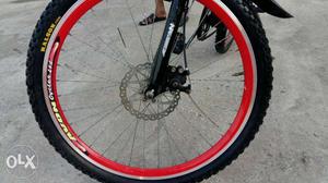 Red And Black Bicycle Wheel