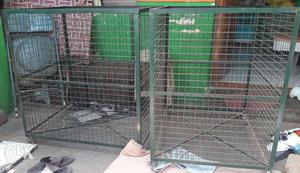 Two Green Metal Kennels