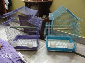 Two Purple And Blue Wire Birdcages
