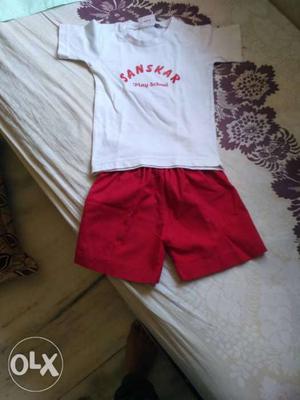 White Crew-neck T-shirt And Red Shorts