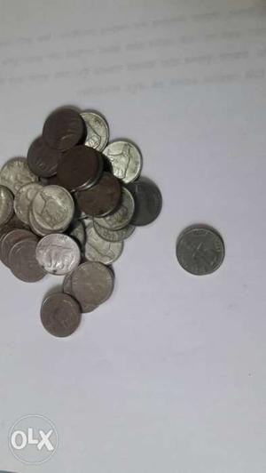 50 pieces of 25 paise coins
