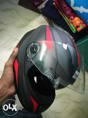 Black And Red Full-face Helmet.new one. not used.