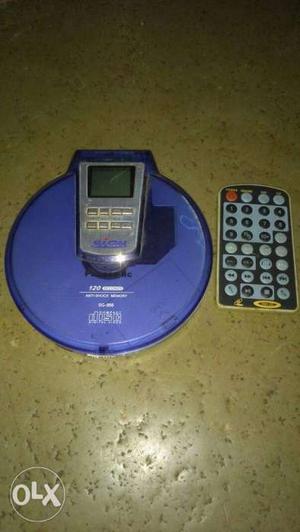 Blue And Gray Digital Device With Remote