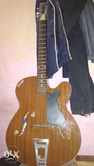 Brown And Black Cutaway Guitar