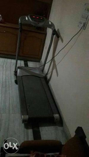 Gray And Black Automatic Treadmill
