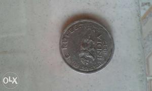 It is a 1 rupee coin of  of george 6 king