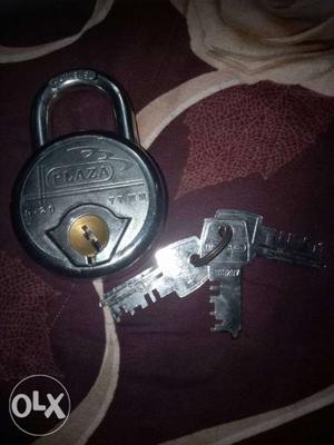 Round Gray Padlock With Keys