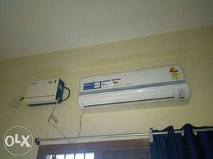 Samsung White Split-type Air Conditioner with stabilizer.