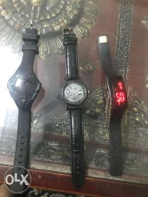 Three Black Mechanical And LED Watches