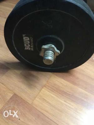 Two 7.5kg plates and rod for dumbell