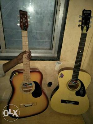 Two Natural And Sunburst Dreadnought Acoustic Guitars