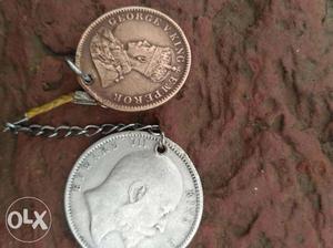 Two Round Gold-colored And Silver-colored Coin Pendants