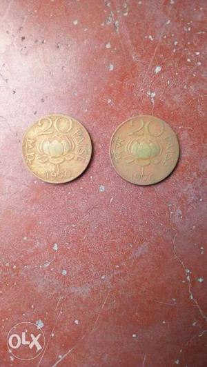 Two Round Silver-colored 20 Indian Paise Coins