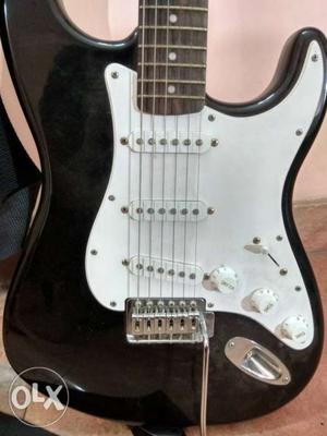 White And Black Stratocaster Electric Guitar