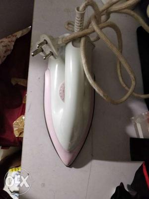 White And Pink Clothes Iron