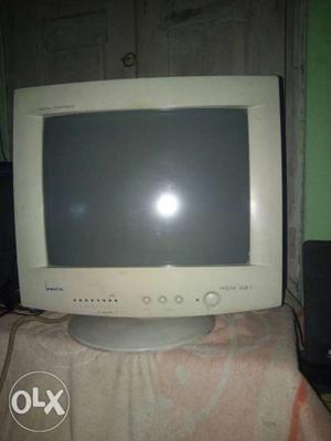 White CRT Computer Monitor With Computer Tower