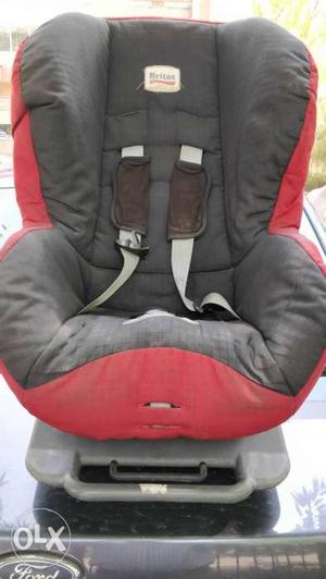 Baby's Gray And Red Vehicle Seat Carrier