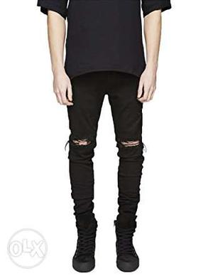 Black ripped jeans price: 900 size.