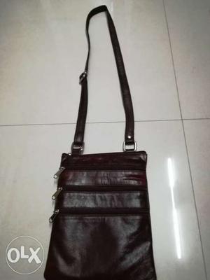 Chocolate color pure leather sling bag Has 5