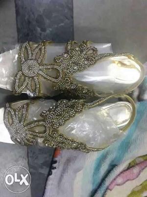 Golden color high heels sandal