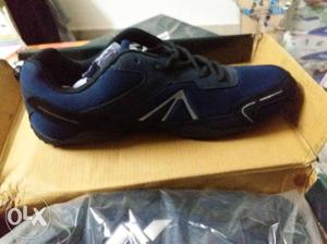 Pair Of Black Nivia Cleats, Size 7