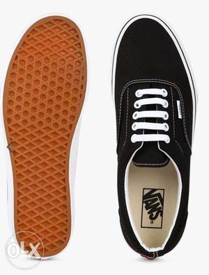Pair Of Black Vans Low-top Sneakers