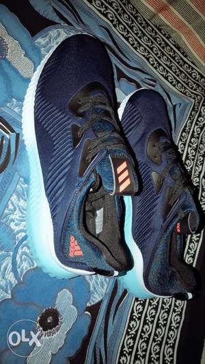Pair Of Blue-and-black Adidas Shoes new