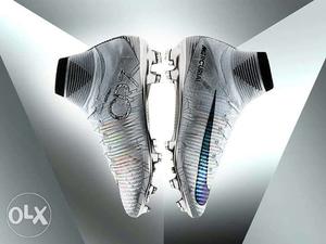 Pair Of Gray Nike Mercurial Cleats