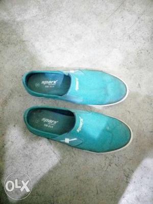 Pair Of Teal Slip-on Shoes