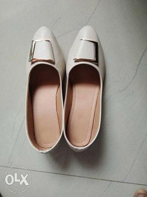 Pair Of White Leather Slip-on Shoes