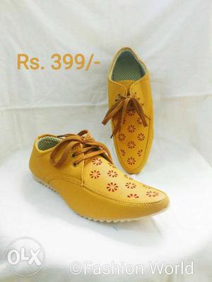 Pair Of Yellow Leather Shoes