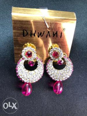 Pink earrings with a clear stones
