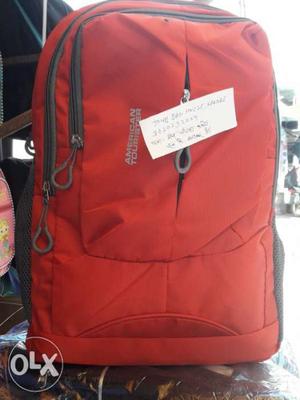 Red And Gray American Tourister Backpack