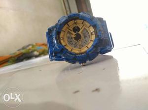 Round Blue And Black Chronograph Watch