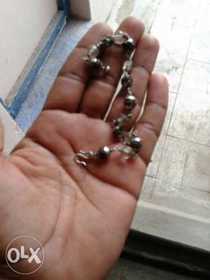 Silver bracelet with og ruthratchai and spadikam