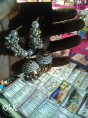 White-and-gold-colored Beaded Jhumka Earrings