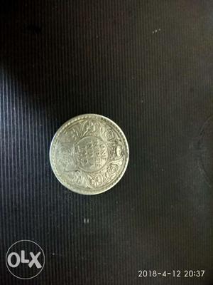 1 rupee  silver king George V(five) coin.
