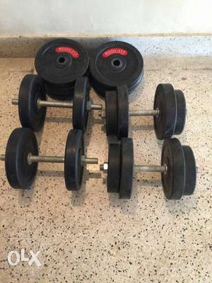 2 pairs dumbles 10 kgs each and additional plates