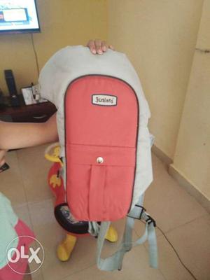 Baby's White And Pink Chicco Car Seat Carrier