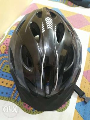 Black And Gray Bicycle Helmet