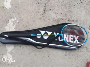 Blue And Gray Yonex Badminton Racket With Black Bag